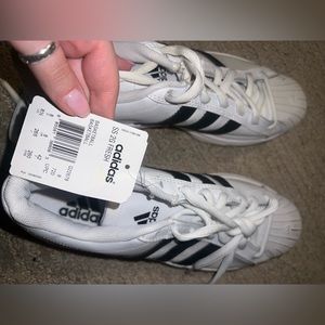 Adidas brand new shoe size 8.5. Never worn
